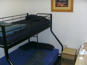 Dubbeldeksbed voor drie personen