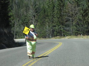 Het stereotype vrouw bij de wegwerkzaamheden.
